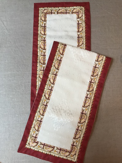 long French table runner with red border